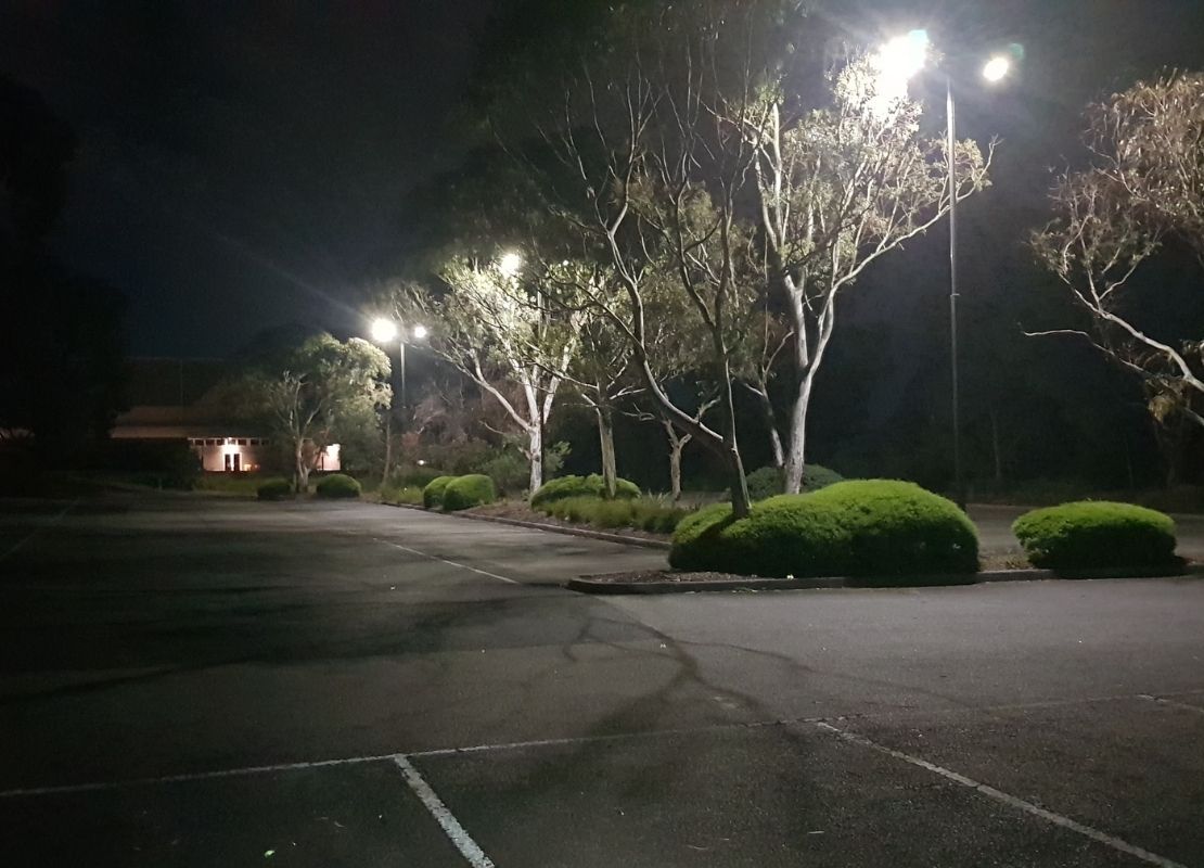 Poorly lit council carpark at night